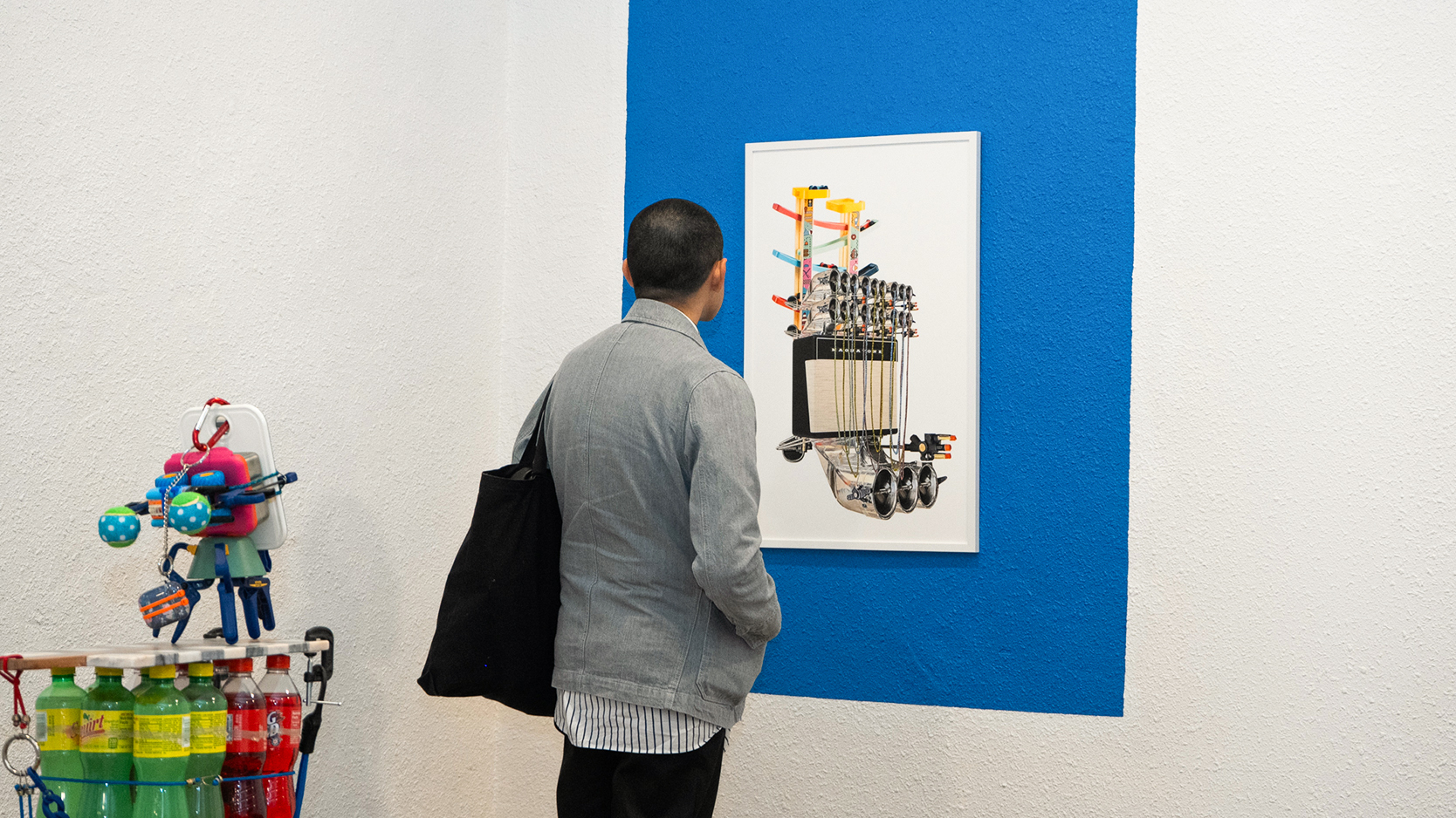 Visitors to La Mecha Contemporary viewing Mama's Boy or An Inexplicable Reasoning art exhibition